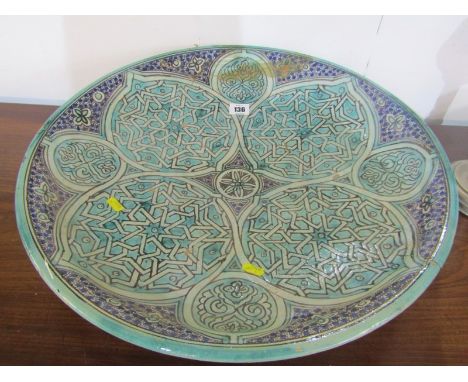ISLAMIC, a large turquoise enamel 20" circular dish, with several crude repairs 