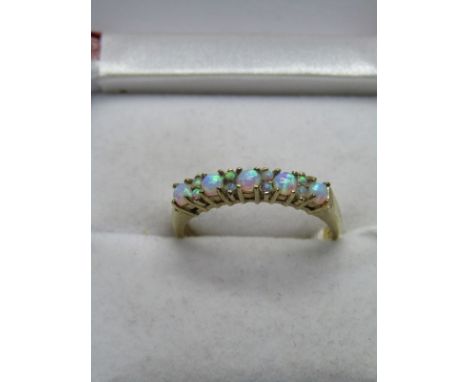 9CT YELLOW GOLD OPAL ETERNITY STYLE RING, size O/P 