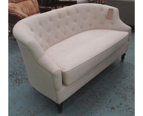 SOFA, two seater, button backed, in an oatmeal fabric on turned supports, 140cm L.