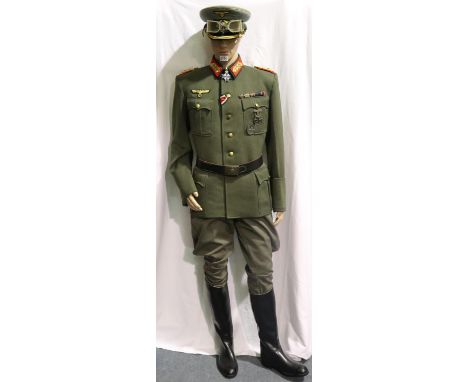 A museum arranged uniform of Erwin Rommel, comprising period and later pieces, including badged tunic with ribbon bar, Blue M