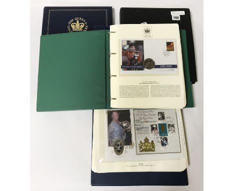 4 ALBUMS OF FIRST DAY COVER STAMPS &amp; COINS