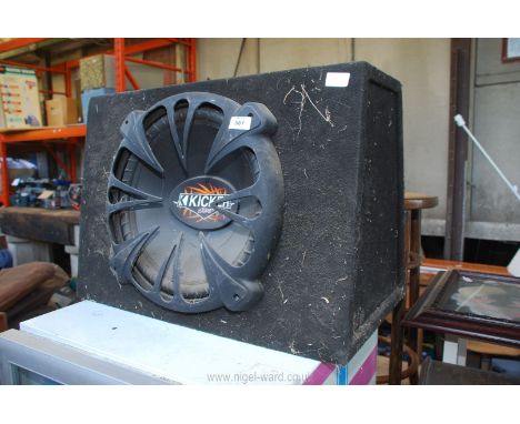 A Kicker large box speaker 25" wide x 18" high x 14" deep.
