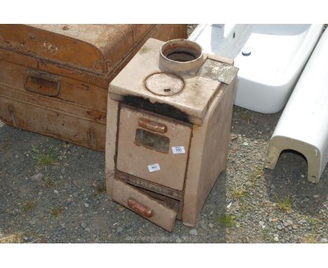 A 'Cresta' solid fuel enamel fire 17" h x 12" square.