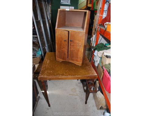 A folding card table and a bedside cabinet 30" square x 27" high.