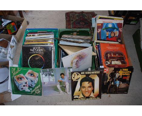 Three boxes of mixed L.P. records including Elvis, Barry Manilow, the Rolling Stones, Lionel Ritchie, etc. 