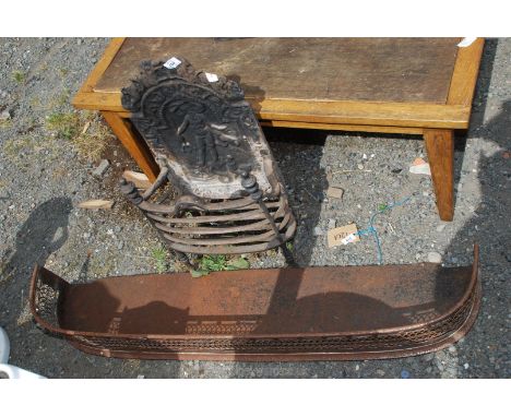 A fire grate and fender.