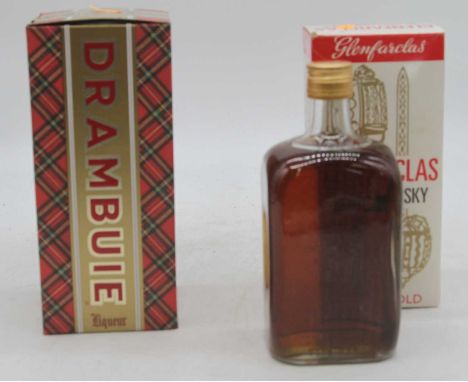 Glenfarclas 15 year old Scotch Whisky 26 2/3 fl.oz 80° proof, five bottles in cartons, and Drambuie Liqueur 75cl 40%, one bot