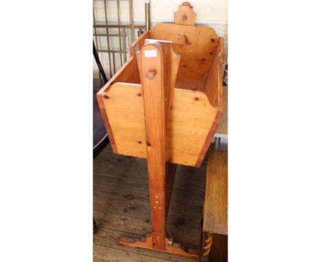 A large vintage pine rocking cradle