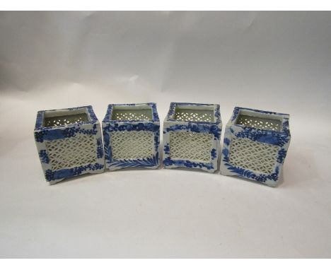 Four Oriental blue and white square form reticulated cricket pots/incense burners. 9cm square