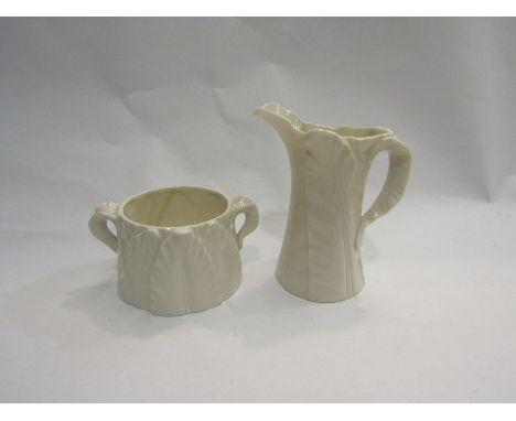 A Royal Worcester leaf form jug and pot