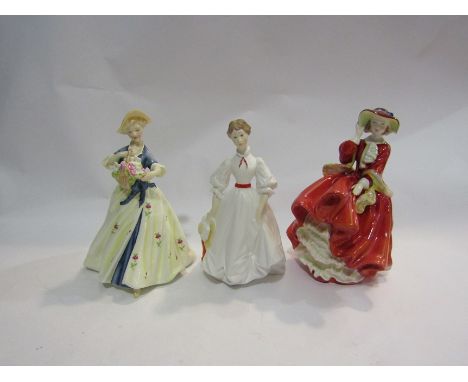 A Royal Doulton lady "Top O' the Hill" and two Royal Worcester ladies (3)