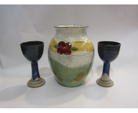 A modern Poole Pottery vase and a pair of Canterbury pottery goblets (3)