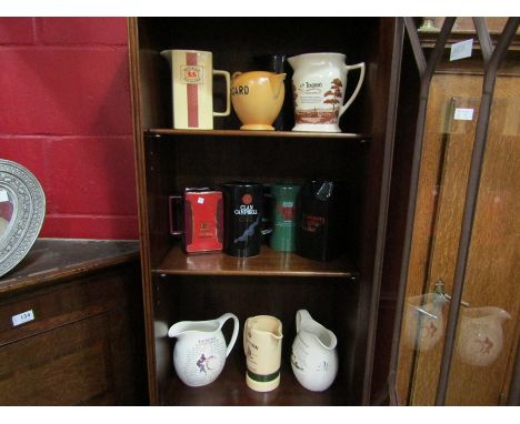 Eleven assorted ceramic whisky jugs including Jameson, Teacher's, Clan Campbell etc.