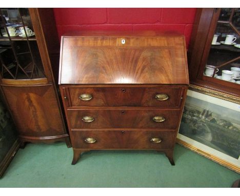 A circa 1840 flame mahogany bureau with bone key escutcheon, the fitted interior over three graduating long drawers on outswe