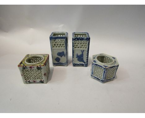 Four Oriental reticulated cricket pots/incense burners. Two of tall rectangular form, hexagonal and square form. Blue and whi