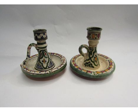 A near pair of early 20th Century faience glazed ceramic candle stick holders, hairline crack to one, signed Safi to base. Ap