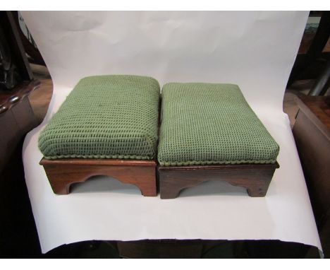 A pair of Victorian footstools on bracket feet