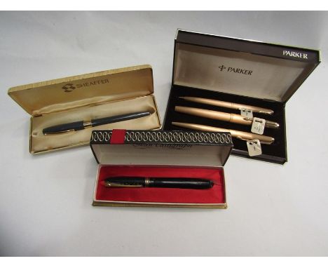 A Parker 61 Cirrus 1/10 pen set, Sheaffer 14k fountain pen and Swan Calligraphy pen all cased