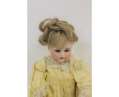 SIMON &amp; HALBIG FOR KAMMER &amp; REINHARDT DOLL the small doll with weighted blue eyes, open mouth and pierced ears. Marke