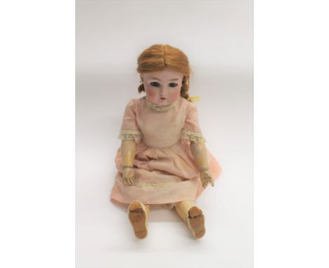 SIMON &amp; HALBIG FOR KAMMER &amp; REINHARDT DOLL the doll with weighted brown eyes and open mouth. Impressed marks, Simon &