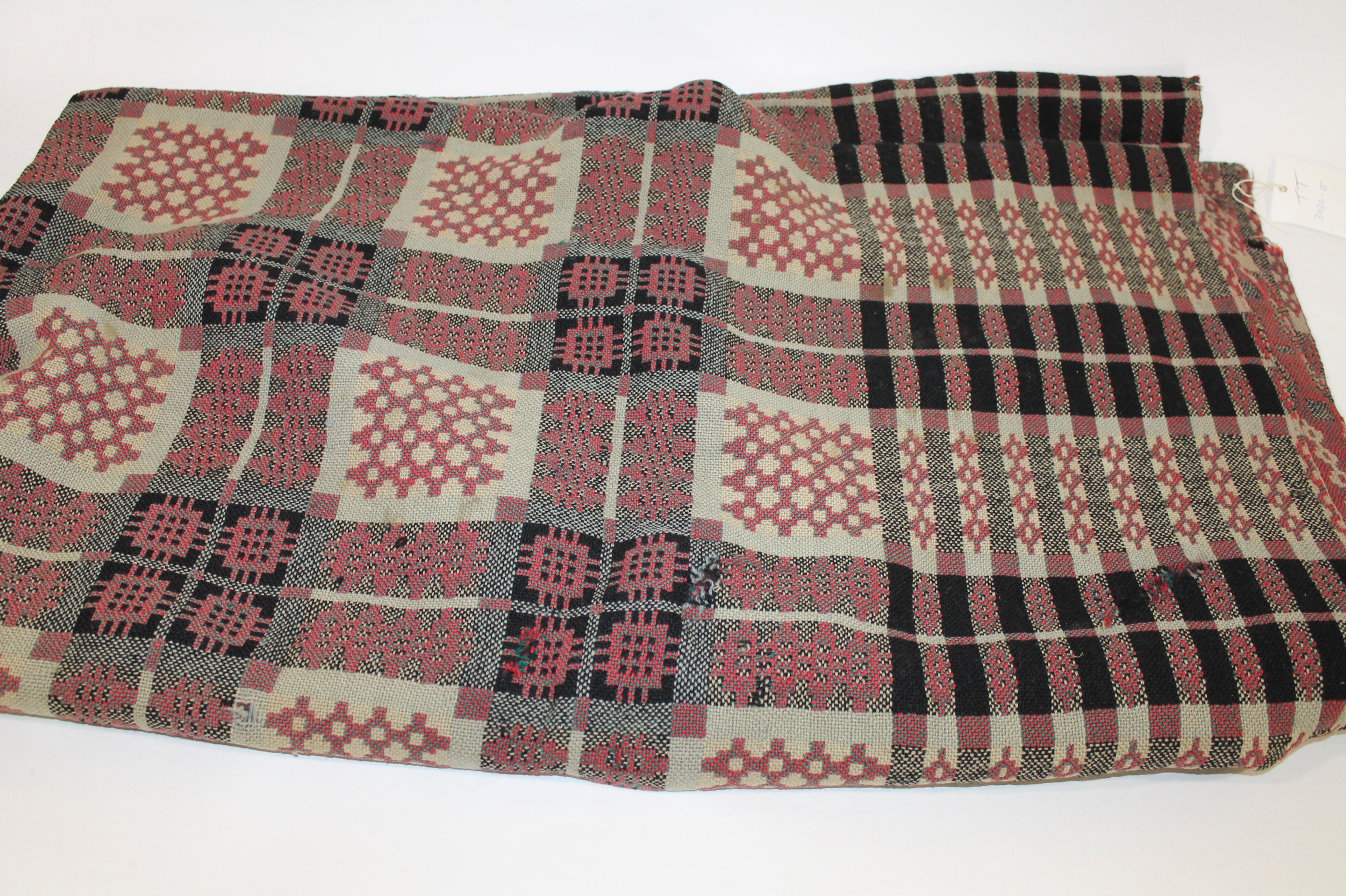 WELSH BLANKET a mid 20thc Welsh wool woven blanket, worked in black