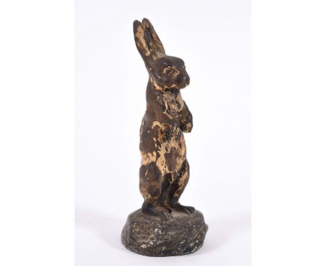 ALVIS BRONZE CAR MASCOT - HARE a bronze model of a standing Hare, made for a Alvis car. With the remains of some painted deco