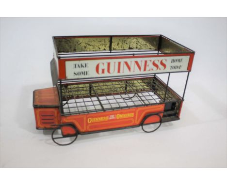 GUINNESS OMNIBUS a tin plate advertising bottle rack in the form of an Omnibus, circa 1960's. Also with a Carltonware Guinnes