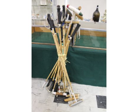VINTAGE POLO MALLETS a collection of 12 vintage polo mallets, also with a polo helmet. (13)