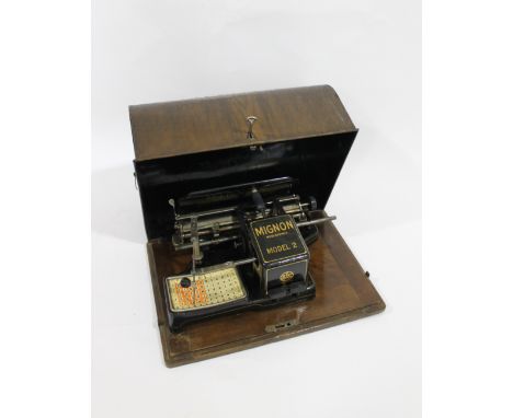 MIGNON CASED TYPEWRITER a Mignon Model 2 Typewriter, in it's metal case and made by The Electrical Company, London, Manufactu