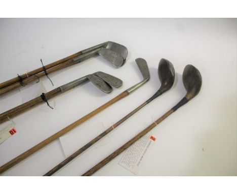 EARLY GOLF CLUBS various clubs including a Dreadnought Driver (no makers name), a steel shafted wood by R Forgan, two Left Ha