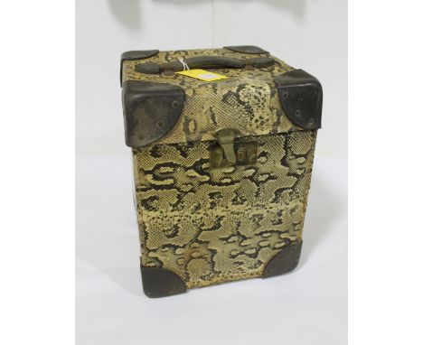 BIBA LUGGAGE TRUNK a tall narrow trunk with snake effect exterior and leather handle, and red lined interior. With a label in