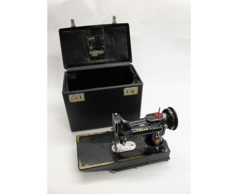 SINGER SEWING MACHINE - 222K a Singer 222K Featherweight portable sewing machine, in a fitted case and with some accessories 