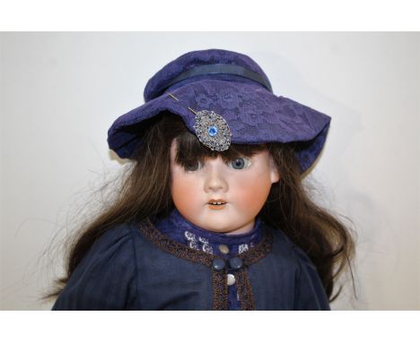 LARGE MAX HANDWERCK DOLL a large doll with weighted blue eyes and open mouth. Impressed marks, Max Handwerck, Germany, 4 1/2.