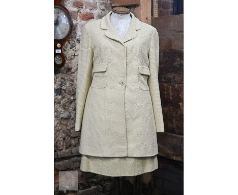 Chanel Boutique - A summer suit in dark cream cotton, with long-fitted jacket, two waist pockets and fitted short skirt, size