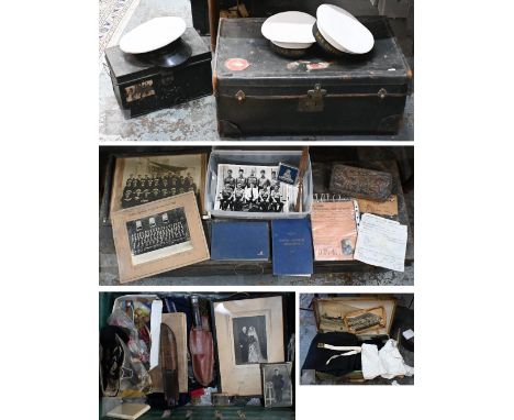 A black military style steel transit trunk containing a quantity of Royal navy officers uniform components incl; caps; tunics