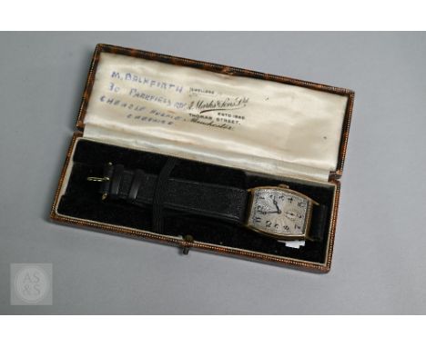 A gentleman's 9ct gold Rolex tonneau wrist watch, 1930s, the silver engine turned dial with Arabic numerals and subsidiary se
