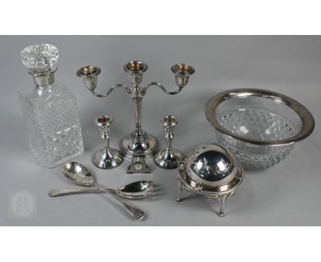 A loaded silver twin-branch candelabrum, Birmingham 1957, 21cm high, to/w a pair of 11cm candlesticks, Birmingham 1982, a hea
