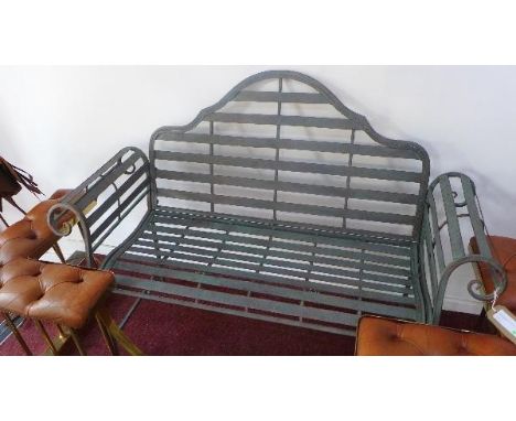 A grey painted steel garden bench, with scroll arms, H.72 W.135 D.50cm 