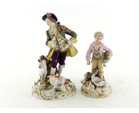 A very well modelled ceramic figure of a gallant holding a rose with sheep and flowers at his feet, gold anchor mark to back 