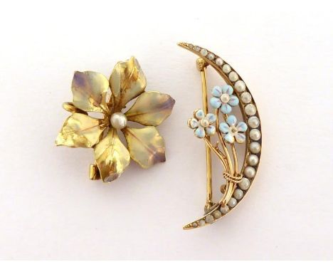 Two enamel and seed pearl brooches, the first modelled as flower, the leaves with opalescent enamel, a small seed pearl to th