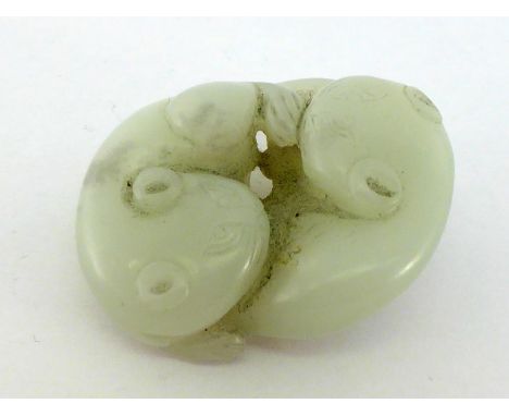 A Chinese white jade carving of “cat group” pendent, carved as two cats playing together, One is lying down next to the other