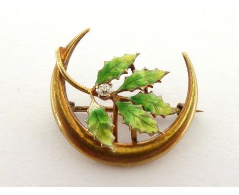 A diamond and enamel brooch, modelled as a sprig of holly, an old cut to the centre, a crescent around, 2cm long, 1.4gms COND