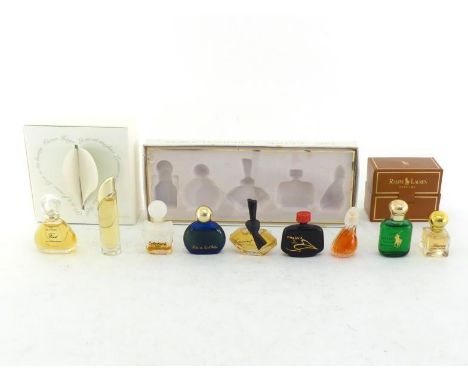 A Van Cleef and Arpels two bottle presentation box of eau de toilette “First” and “Murmure”, condition excellent, a Ralph Lau