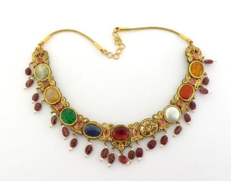 An Indian multi-gem and enamel necklace, set along its length with ruby, sapphire, foil backed emerald, diamond cluster, mabe