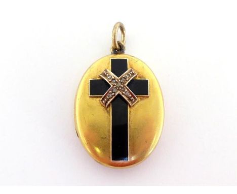 A Victorian gold, diamond and enamel mourning locket, the black enamel cross with rose cut detail, 3cm long, 11.4gms CONDITIO