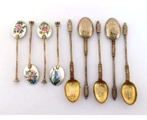 Five Scandinavian silver-gilt coffee spoons with figural finials modelled as a bearded man in cloak and cowl, stamped 13.1/4L