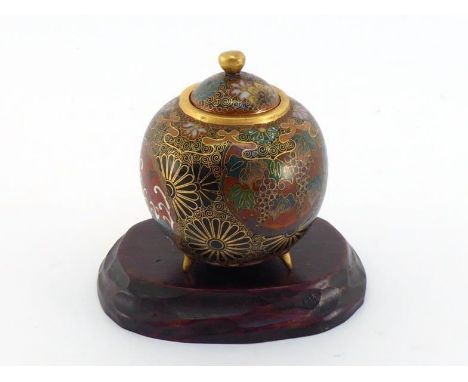 A small Japanese Ando cloisonné enamel jar in ovoid form with lid and tripod, very detailed multicolour archaistic design on 