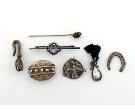 A mixed lot of late 19th cenutry white metal mounted jewellery, including a French mabe pearl and marcasite pendant, a smokey