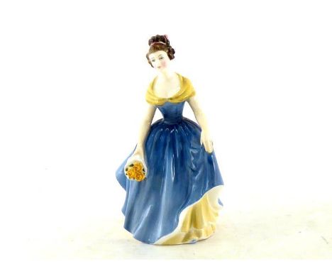 A ceramic Royal Doulton lady “Melanie”, with green backstamp. 