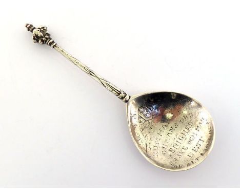 A Scandinavian silver spoon with cherub mask terminal, apparently unmarked except for a later French swan control mark on the